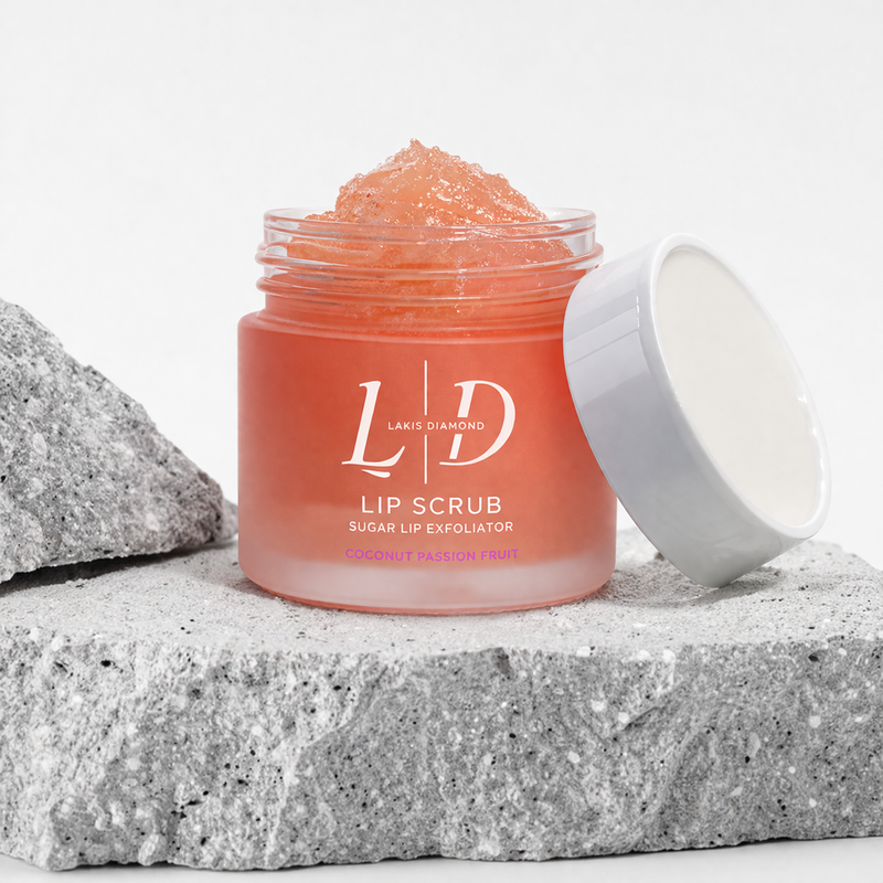 Jar of lip scrub with a white lid on a gray stone surface